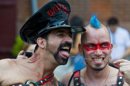 NEW YORK -  JUNE 26 : An unidentified participants celebrates gay pride parade after passing the same sex marrige bill in New York city on June 26 2011.