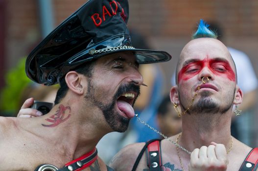 NEW YORK -  JUNE 26 : An unidentified participants celebrates gay pride parade after passing the same sex marrige bill in New York city on June 26 2011.