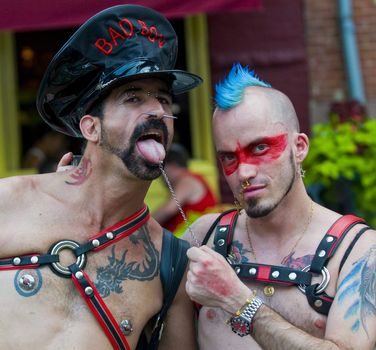 NEW YORK -  JUNE 26 : An unidentified participant celebrates gay pride parade after passing the same sex marrige bill in New York city on June 26 2011.