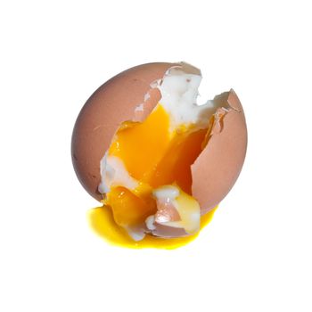 Split underdone boiled egg show detail of yolk and albumen inside