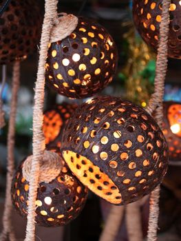 Lamp make from coconut shell and rope