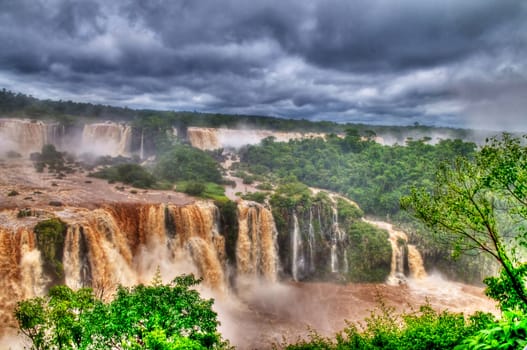 View of the Iguasu falls , Iguasu falls are the largest series of waterfalls on the planet located in the three borders of Brasil Argentina and Paraguay