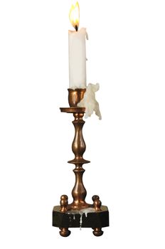 Candlestick ancient with a candle on the white isolated background
