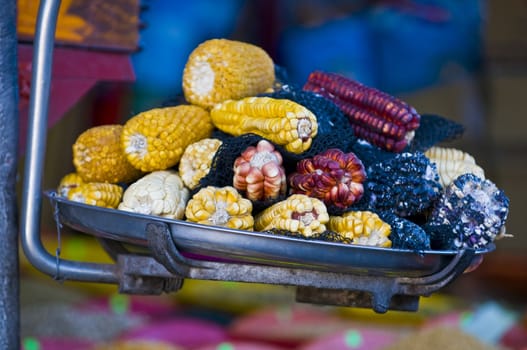 Different types of corn on a market in Peru