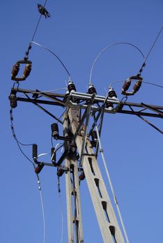 Electrical tower on a background of the blue sky