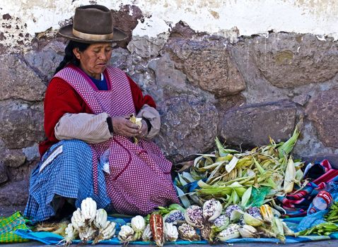 Cusco , Peru - May 27 : Peruvian woman in a market in Cusco Peru , May 27 2011