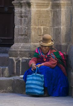 Cusco , Peru - May 27 : Peruvian woman in a market in Cusco Peru , May 27 2011