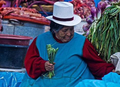 Cusco , Peru - May 27 : Peruvian woman in a market in Cusco Peru , May 27 2011