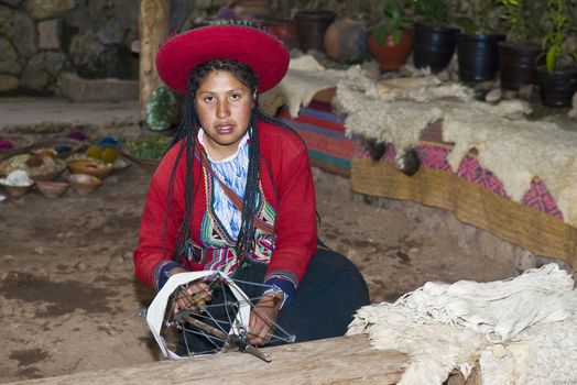 Cusco , Peru - May 26 2011 : Quechua Indian woman weaving 