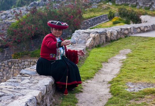 Cusco , Peru - May 26 2011 : Quechua Indian woman weaving 