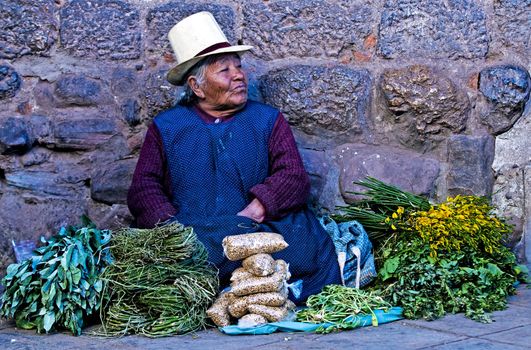 Cusco , Peru - May 27 : Peruvian woman in a market in Cusco Peru , May 27 2011