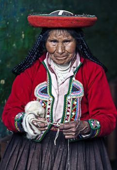 Cusco , Peru - May 26 2011 : Quechua Indian woman weaving 