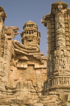 Ornate carved stone tower built to celebrate an ancient victory. Chittaugarh Rajasthan India.