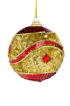 Big golden red Christmas ball decoration isolated on white background.