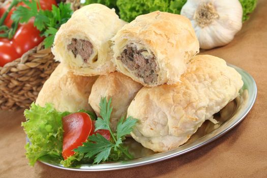 Arab meat mince pie with fresh lettuce, tomatoes and parsley