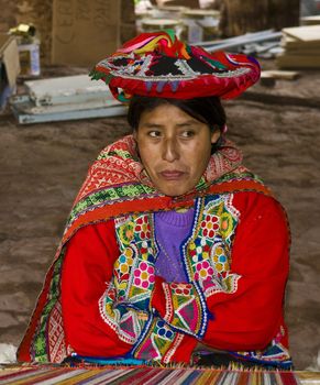 Cusco , Peru - May 26 2011 : Quechua Indian woman weaving with strap loom