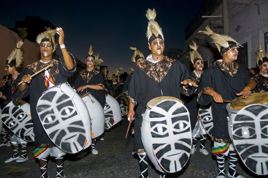 MONTEVIDEO,URUGUAY-FEBRUARY 5 2011: Candombe drummers in the Montevideo annual Carnaval ,  Candombe is a drum-based musical style of Uruguay. Candombe originated among the African population in Montevideo Uruguay