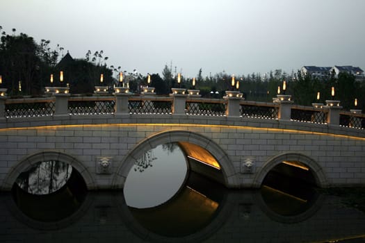 bridge over a pond at the Garden Expo in Xi'an