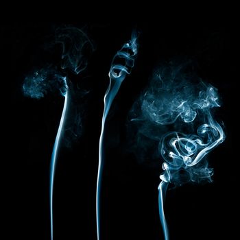 Abstract smoke isolated on dark background.