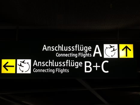 Arrival destination signs in an airport in Germany