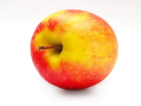 Red and yellowish apple, isolated towards white