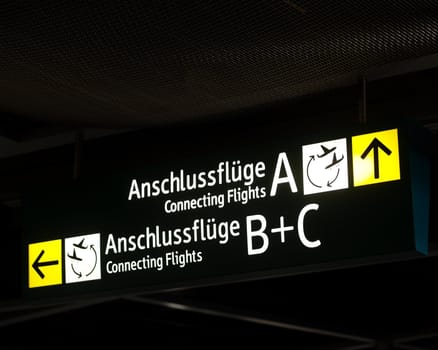 Arrival destination signs in an airport in Germany