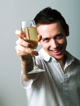 Young man drinking champaign