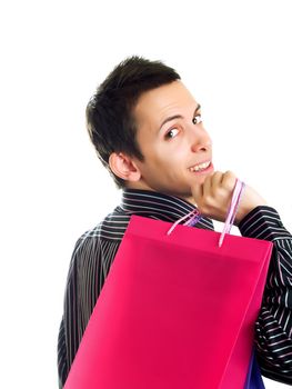 Young man holding shopping bags