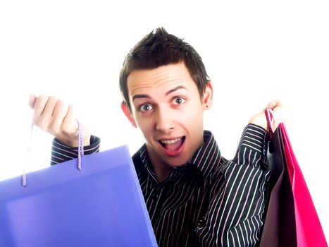 Young man holding shopping bags