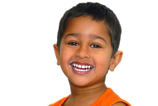 An handsome kid happy after drinking milk