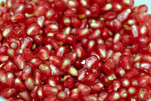 Pomegranate fruit isolated on a over white background