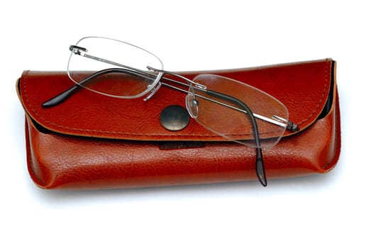 A pair of glasses and its case islted on a white back ground