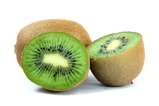 one kiwi and two half isolated on white background healthy eating and agriculture concepts