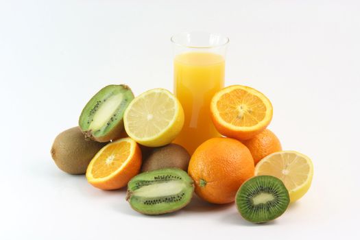 glass of juice with fruits oranges lemons and kiwi isolated on white background agriculture and healthy eating