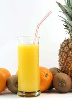 glass of juice with fruits oranges kiwi and ananas isolated on white background agriculture and healthy eating