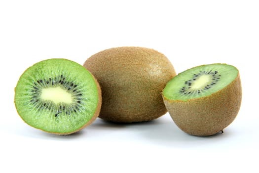 kiwi and two half isolated on white background healthy eating and agriculture concepts
