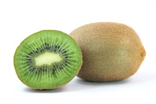 hole and half kiwi fruit isolated on white background healthy eating and agriculture concepts
