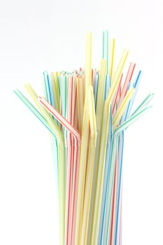 multicolor straws isolated on white background celebration concepts