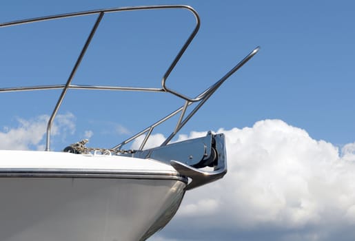 Bow of yacht against summer sky