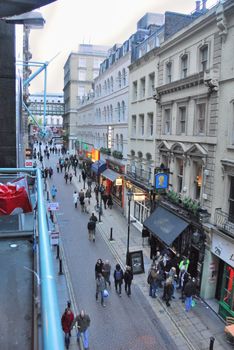 This quiet street, photographed in the early evening is very nice place to eat out.
