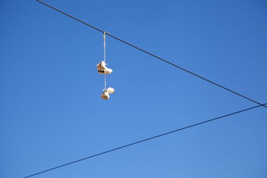 Shoes on cable, alone, desolate