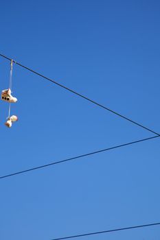 Shoes on cable, alone, desolate