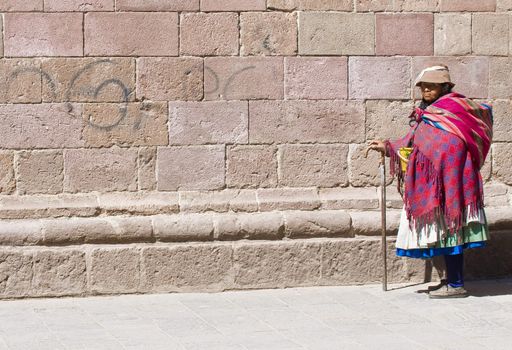 Cusco , Peru - May 28 :  Peruvian woman walk in the narrow alleys of  Cusco Peru 