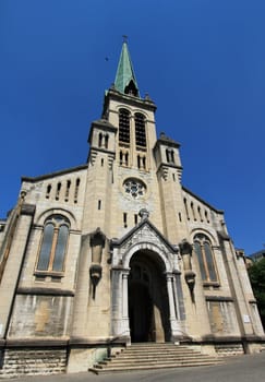 Facade of old Notre-Dame church at Aix-les-Bains, France, by beautiful weather