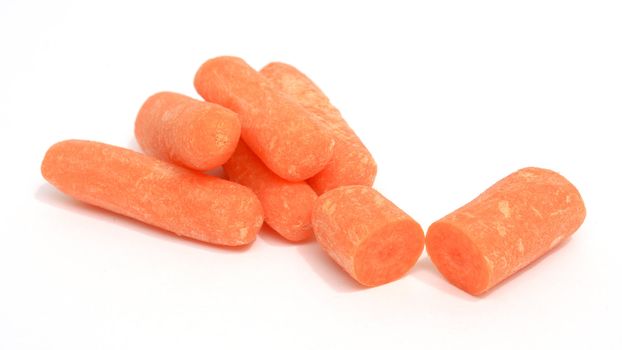 Baby carrots on white background