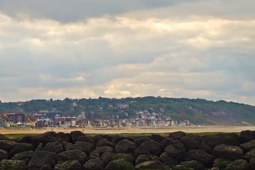 Rays of light on a small village facing the Juno Beach, Normandy