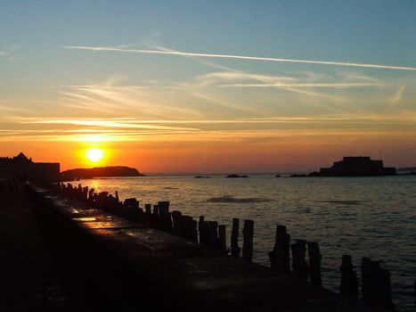 Sunset on the the promenade of Saint Malo