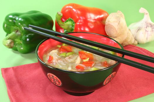 sour spicy Thai soup with glass noodles, chicken, bamboo shoots and peppers