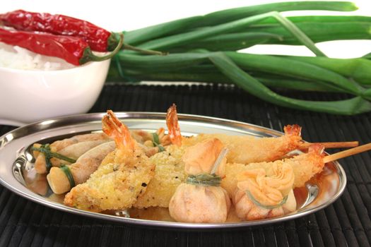 Thai prawns specialties wrapped in filo pastry with surimi, shrimp and vegetables
