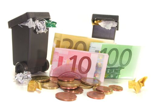 full garbage cans with Euro notes and Euro coins on white background